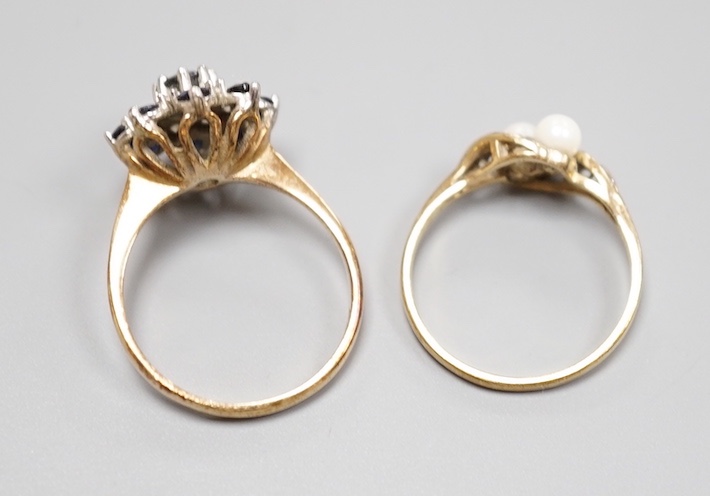 A modern 9ct gold, sapphire and diamond cluster ring and a similar cultured pearl and diamond chip set crossover ring, gross weight 4.9 grams.